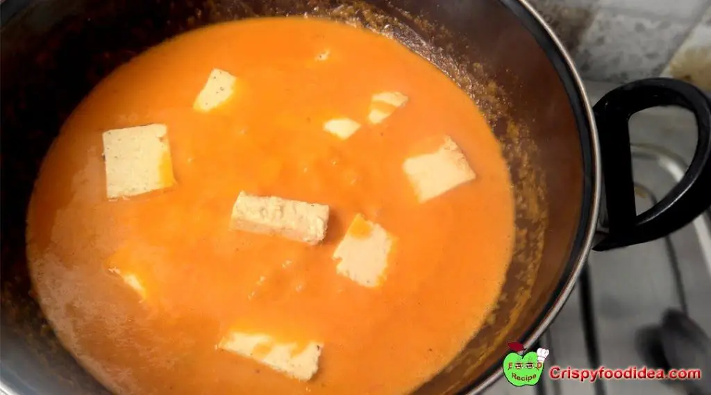 The mixture warms up to 2 or 3 minutes. Then add cubed Paneer in it and stir.