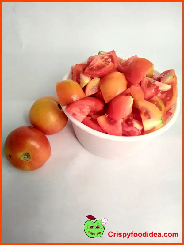 Wash the tomatoes to cut into 1/2" pieces and keep in a bowl aside.