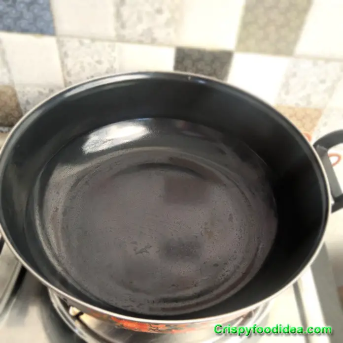 Paneer Pakora | heat a pan with oil