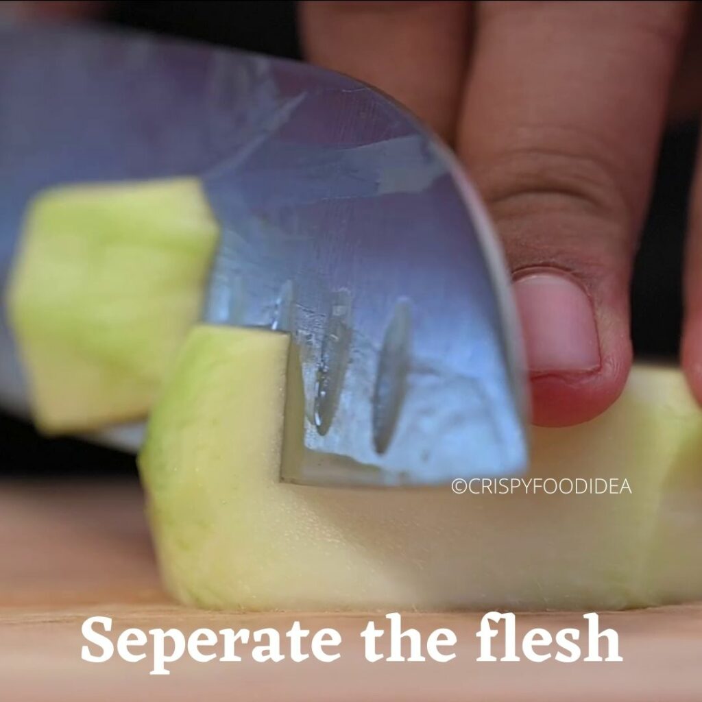 Cut and separate the flesh from the seeds