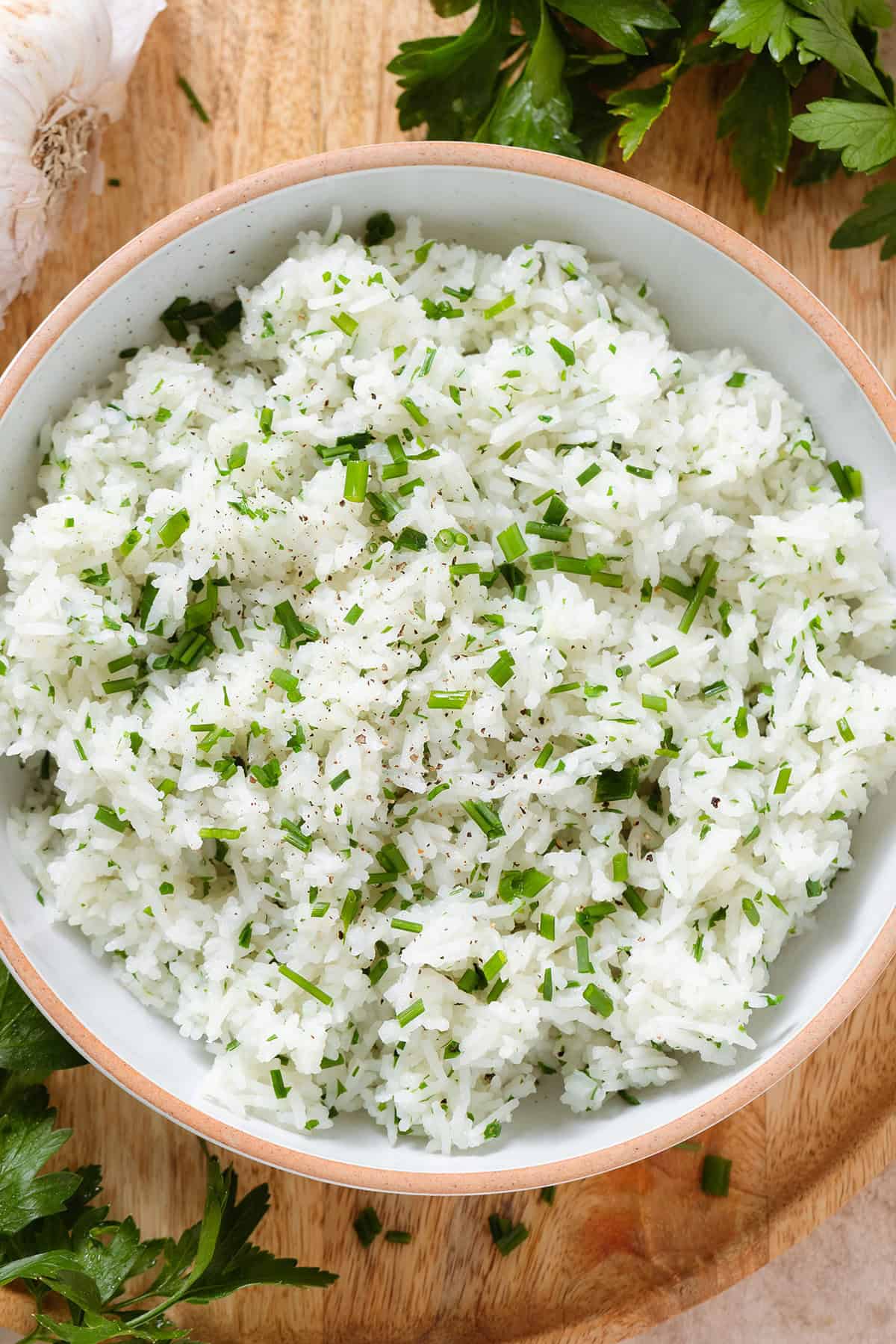 Garlic rice and herb garnish