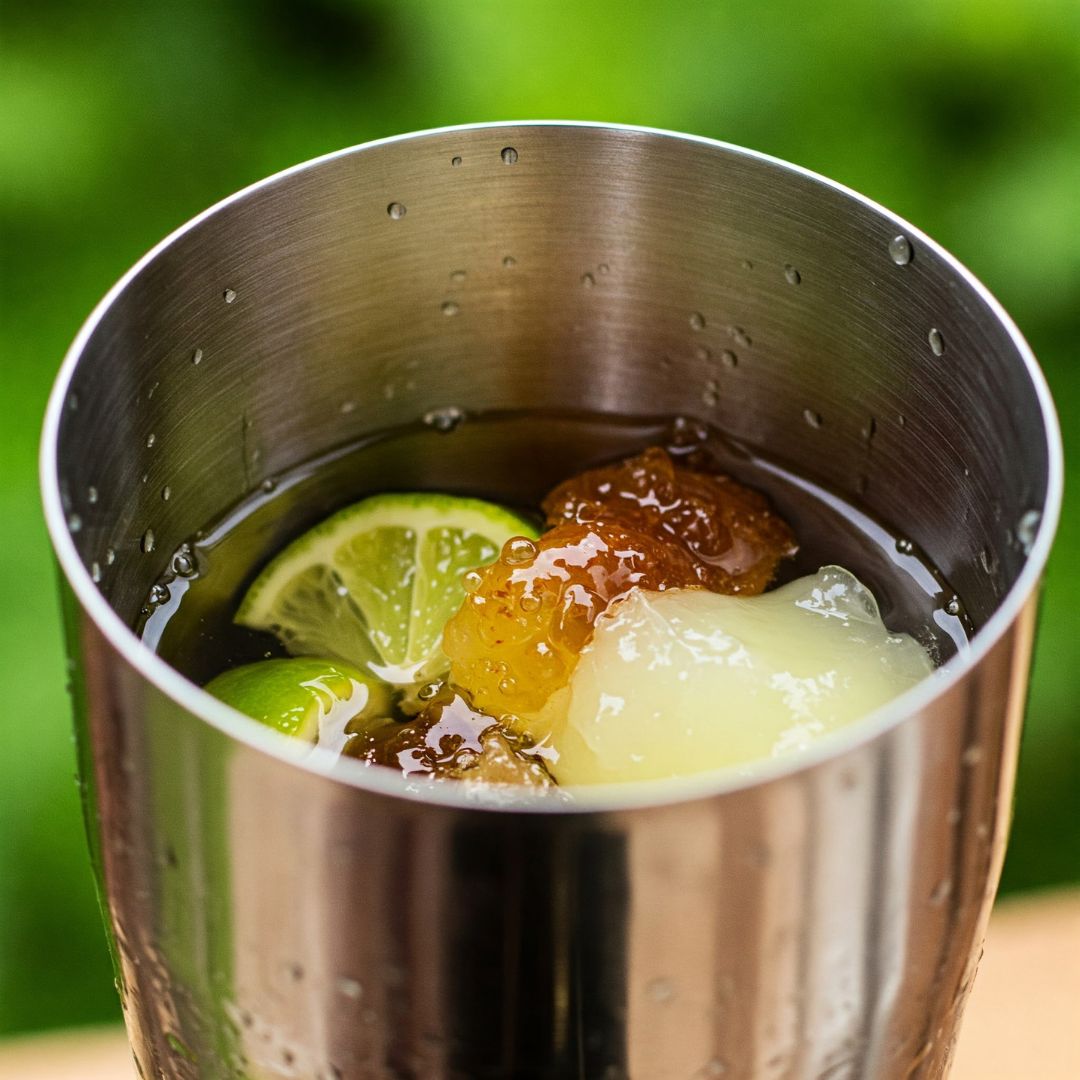 Tequila, lime juice, triple sec, and agave nectar in a shaker