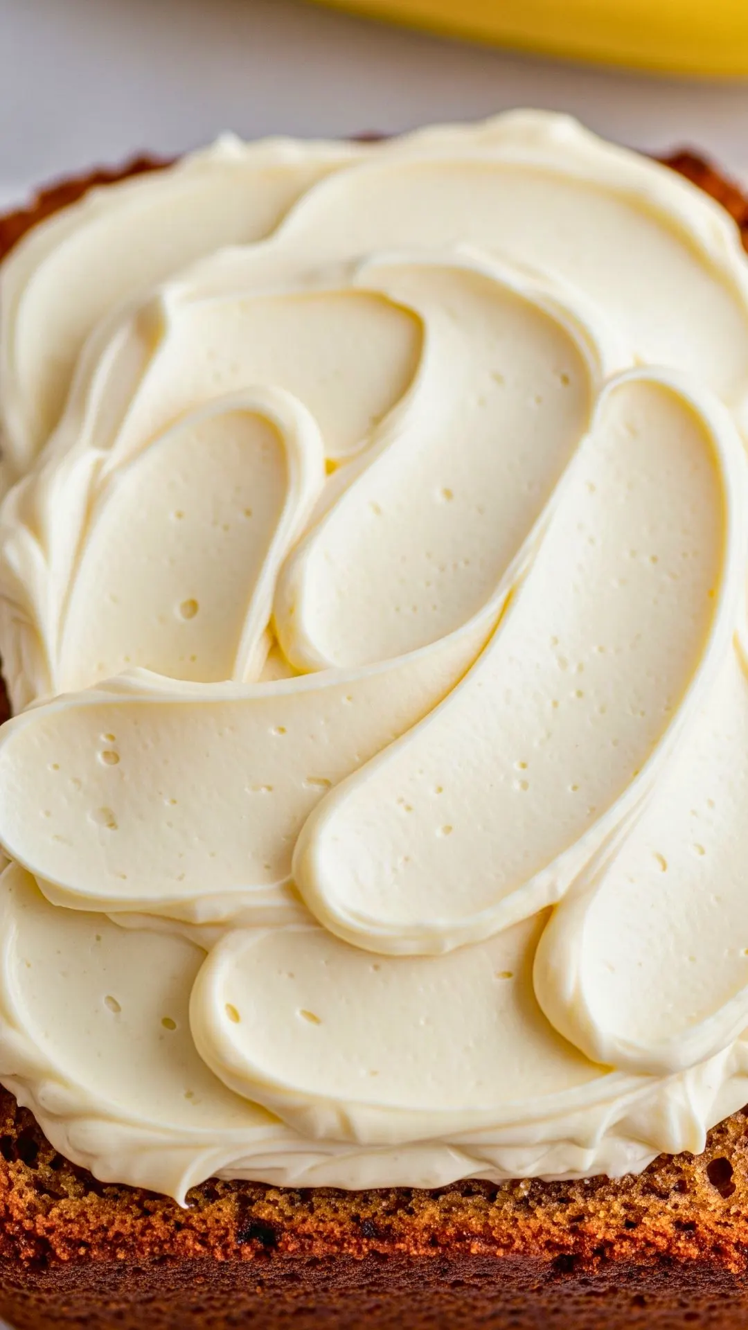 Cream cheese frosting on banana bread